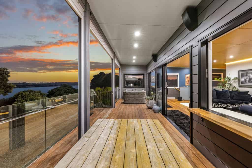 Covered waterfront deck at sunset